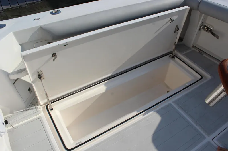  Yacht Photos Pics Open storage compartment on a 2005 Cabo 40 Hardtop Express boat deck.