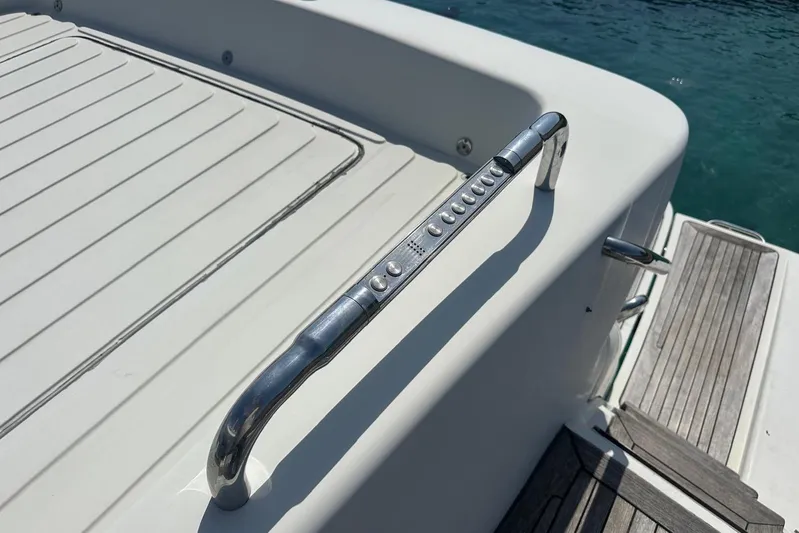 Romeo & Juliet Yacht Photos Pics 2009 Azimut 86S yacht deck with stainless steel handrail and wooden steps.