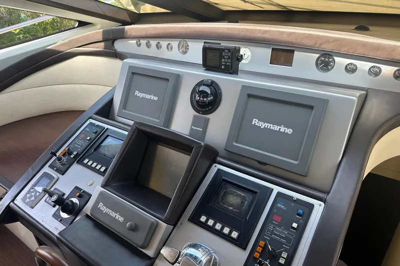 Romeo & Juliet Yacht Photos Pics Control panel of a 2009 Azimut 86S yacht with Raymarine navigation systems.
