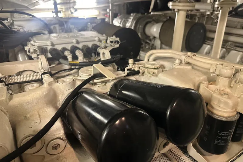 Romeo & Juliet Yacht Photos Pics Engine room of a 2009 Azimut 86S yacht, showcasing mechanical components and filters.
