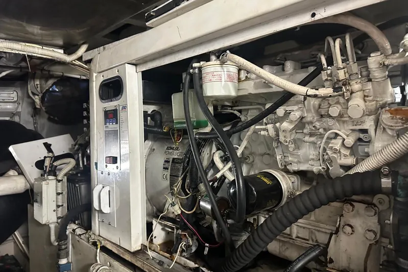 Romeo & Juliet Yacht Photos Pics Engine room of a 2009 Azimut 86S yacht, showcasing mechanical components and wiring.