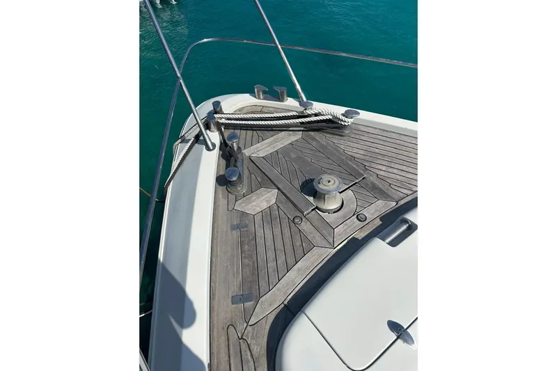 Romeo & Juliet Yacht Photos Pics Bow of 2009 Azimut 86S yacht with teak decking and mooring equipment.