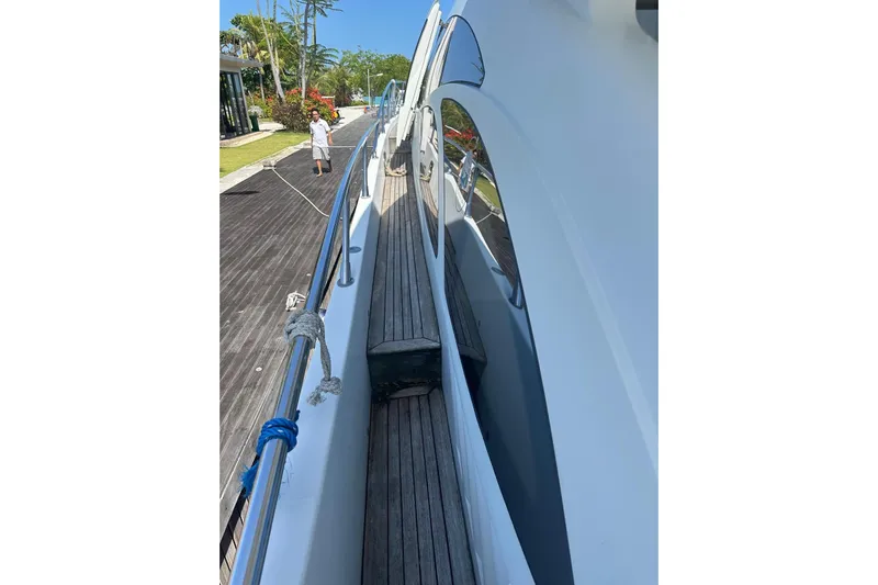 Romeo & Juliet Yacht Photos Pics 2009 Azimut 86S yacht docked, showcasing sleek design and polished deck.