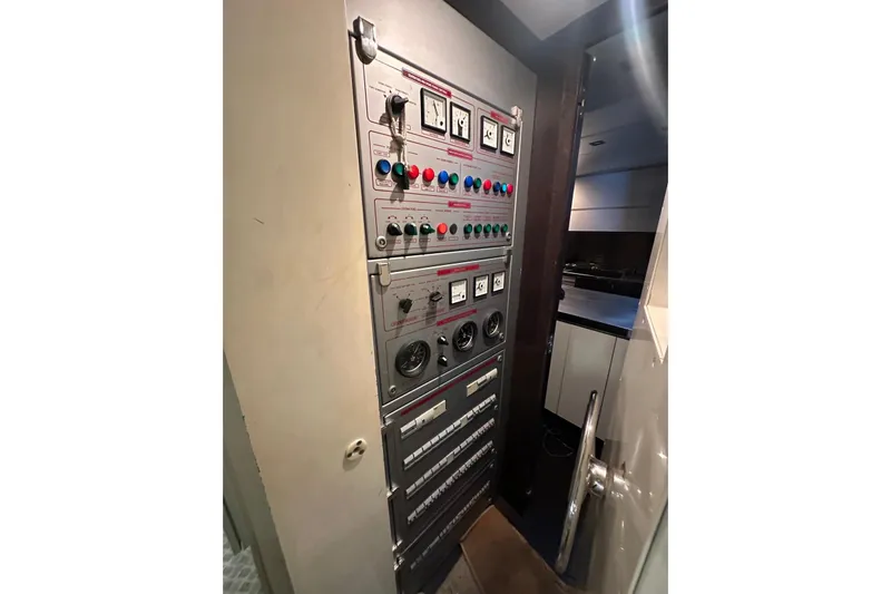 Romeo & Juliet Yacht Photos Pics Control panel inside 2009 Azimut 86S yacht, featuring various switches and gauges.