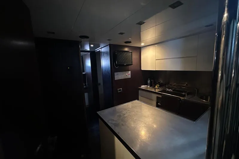 Romeo & Juliet Yacht Photos Pics Interior of 2009 Azimut 86S yacht kitchen with modern design and stainless steel surfaces.