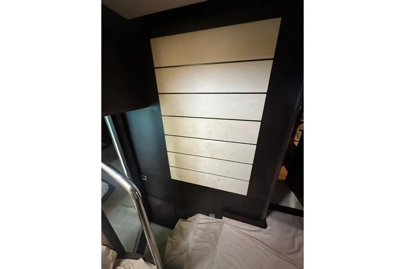 Romeo & Juliet Yacht Photos Pics Interior view of 2009 Azimut 86S yacht with modern paneling and sleek design.