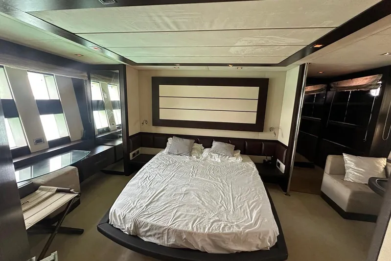 Romeo & Juliet Yacht Photos Pics Luxurious bedroom interior of 2009 Azimut 86S yacht with modern design and large windows.