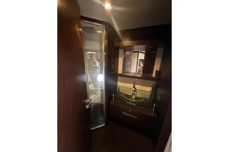 Romeo & Juliet Yacht Photos Pics Luxurious bathroom interior of 2009 Azimut 86S yacht with modern fixtures.