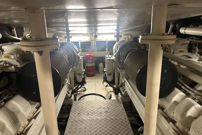 Romeo & Juliet Yacht Photos Pics Engine room of a 2009 Azimut 86S yacht, featuring dual engines and safety equipment.