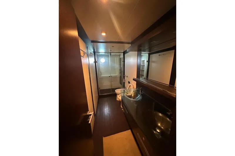 Romeo & Juliet Yacht Photos Pics Luxurious bathroom interior of 2009 Azimut 86S yacht with modern fixtures.