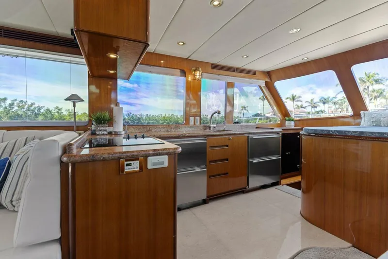 Sunshine And Happiness Yacht Photos Pics Luxurious yacht interior with modern kitchen and panoramic windows.