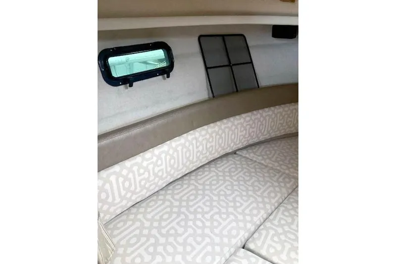  Yacht Photos Pics Interior cabin of 2018 Ranger Tugs R-27 with patterned seating and window.
