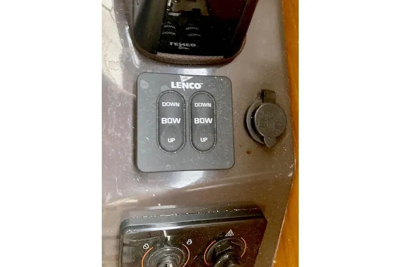  Yacht Photos Pics Control panel of a 2018 Ranger Tugs R-27 boat with Lenco trim tab switches.