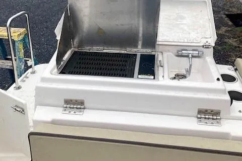  Yacht Photos Pics Outdoor kitchen on 2018 Ranger Tugs R-27 boat with grill and sink.
