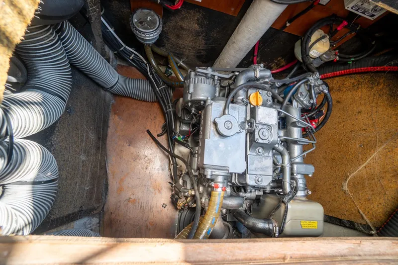  Yacht Photos Pics Engine compartment of a 2009 Lagoon 420 catamaran, showing detailed mechanical components.