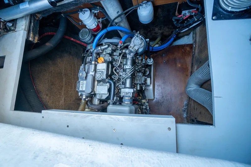  Yacht Photos Pics Engine compartment of a 2009 Lagoon 420 yacht, showcasing mechanical components.
