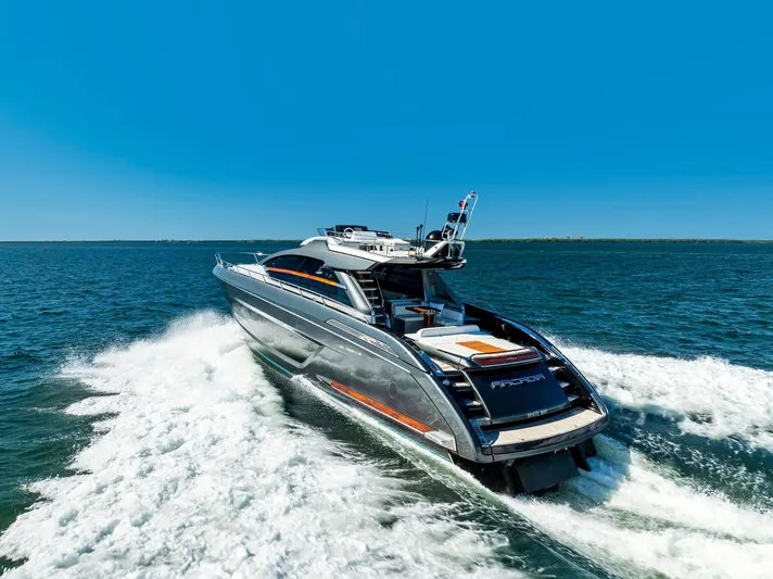 Arcadia Yacht Photos Pics 2020 Riva 66' Ribelle luxury yacht cruising on open water.