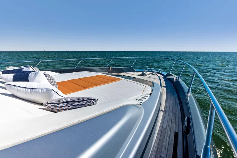 Arcadia Yacht Photos Pics 2020 Riva 66' Ribelle yacht with sun deck on open sea.