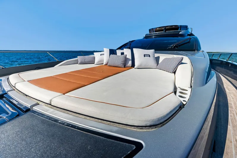 Arcadia Yacht Photos Pics Luxurious 2020 Riva 66' Ribelle yacht with sunbathing deck and cushions.