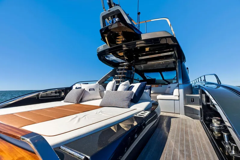Arcadia Yacht Photos Pics Luxurious 2020 Riva 66' Ribelle yacht with elegant deck and seating area.