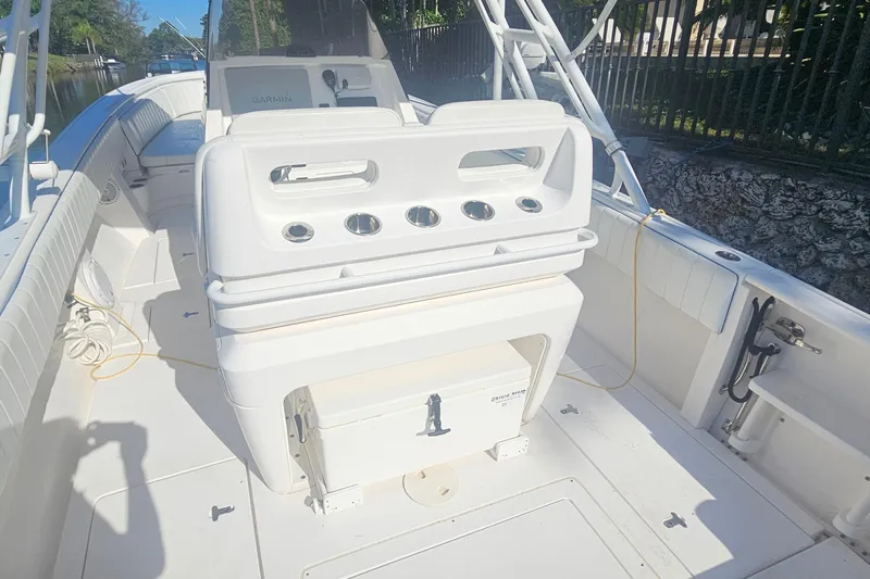  Yacht Photos Pics 2015 Intrepid 327 Center Console boat interior with seating and storage compartments.