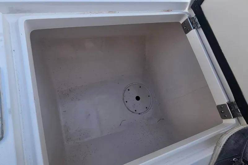  Yacht Photos Pics Open storage compartment on 2015 Intrepid 327 Center Console boat.