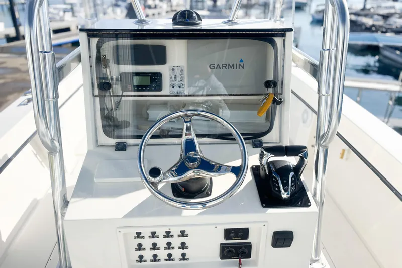  Yacht Photos Pics Center console of a 2016 Whitewater boat with Garmin navigation system.