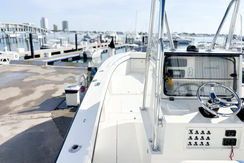  Yacht Photos Pics Whitewater 2016 boat at marina with Garmin navigation system, docked near waterfront.