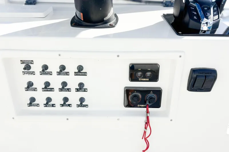 Yacht Photos Pics Control panel of a 2016 Whitewater boat featuring Yamaha switches and various labeled toggles.