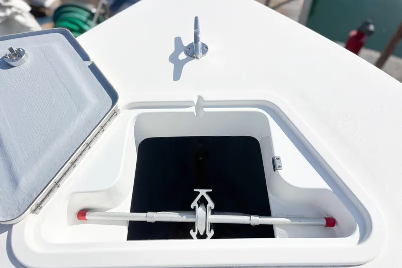  Yacht Photos Pics Open hatch on 2016 Whitewater boat deck, revealing storage compartment.