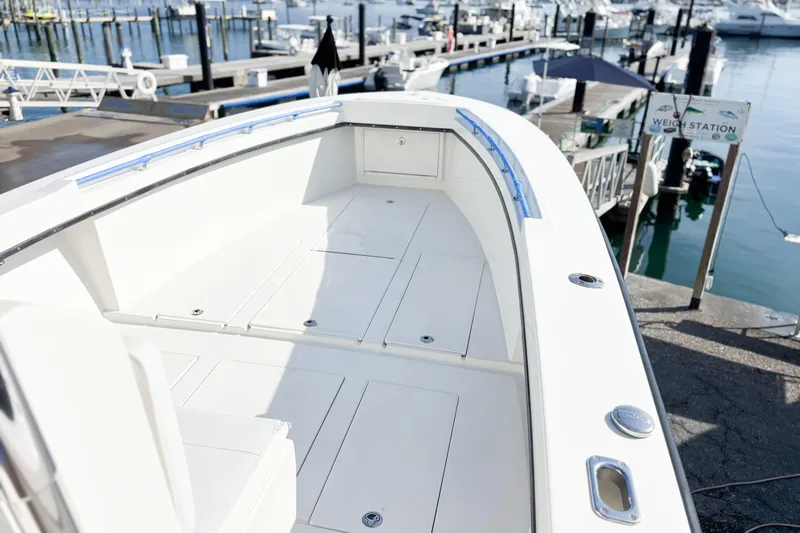  Yacht Photos Pics Whitewater 2016 boat at marina, featuring spacious deck and sleek design.