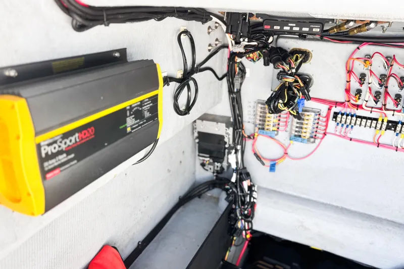  Yacht Photos Pics Electrical system setup in a 2016 Whitewater boat, featuring ProSportHD20 charger and wiring.