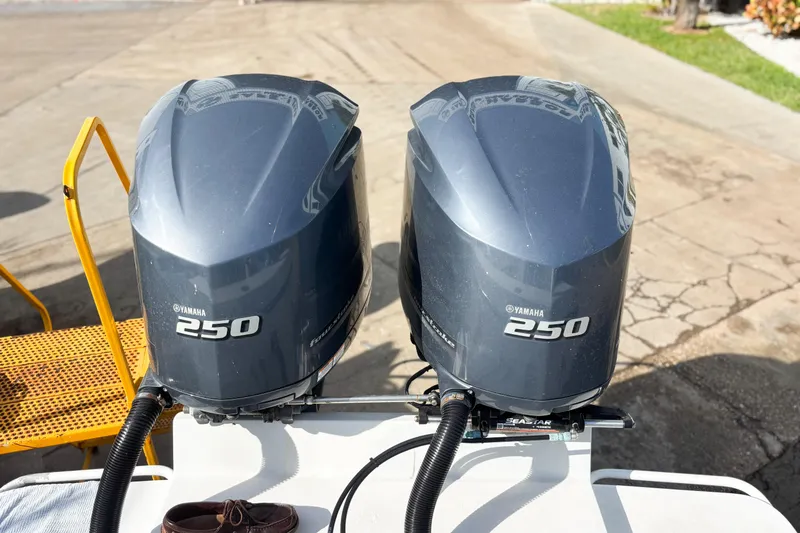  Yacht Photos Pics Twin Yamaha 250 outboard motors on a 2016 Whitewater boat, dockside view.