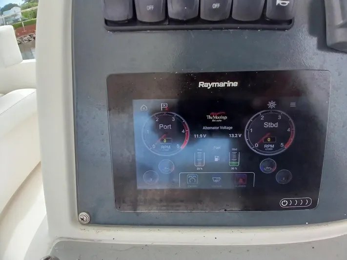 High Life Yacht Photos Pics Control panel of a 2020 Leopard 43 Powercat displaying alternator voltage and RPM.