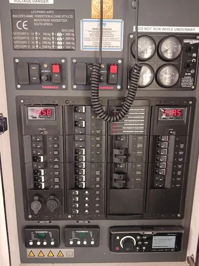 High Life Yacht Photos Pics Electrical control panel of a 2020 Leopard 43 Powercat, featuring switches and gauges.