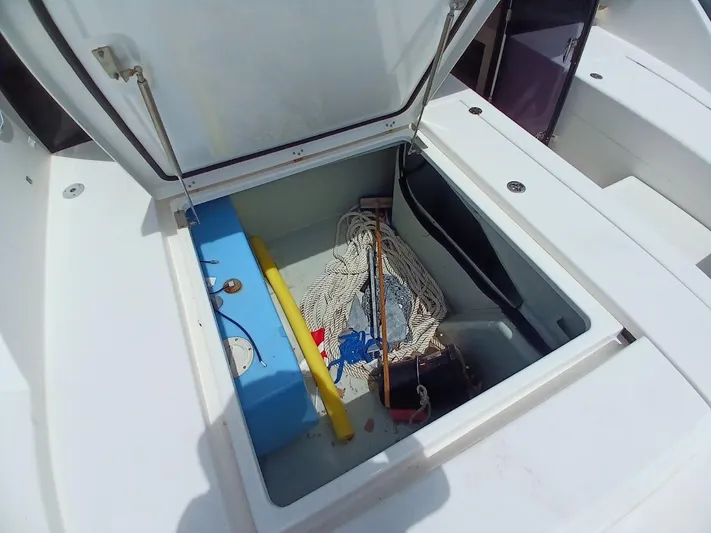 High Life Yacht Photos Pics Open storage compartment on 2020 Leopard 43 Powercat with ropes and equipment.