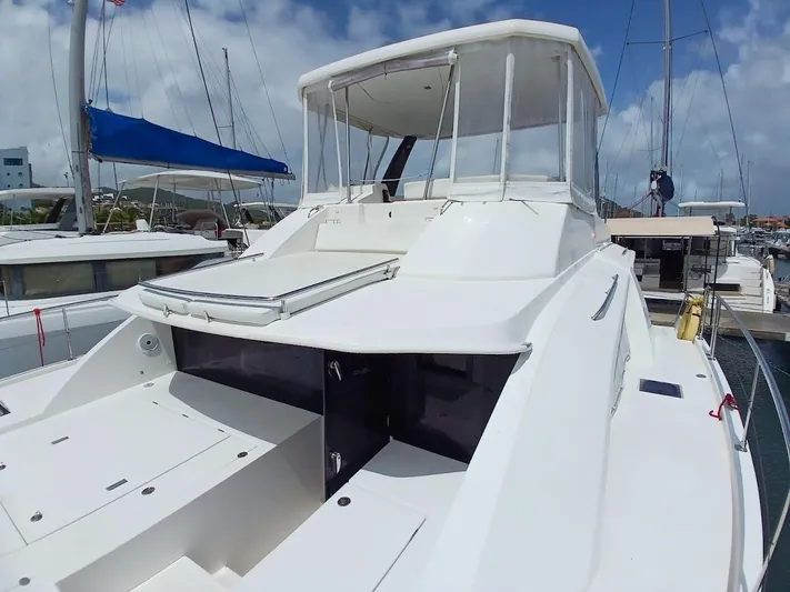High Life Yacht Photos Pics 2020 Leopard 43 Powercat yacht docked at marina under clear sky.