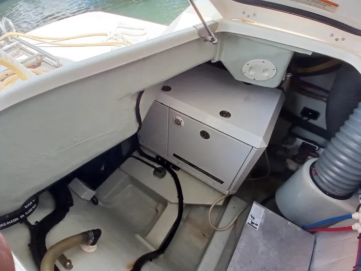 High Life Yacht Photos Pics Engine compartment of 2020 Leopard 43 Powercat with visible machinery and hoses.