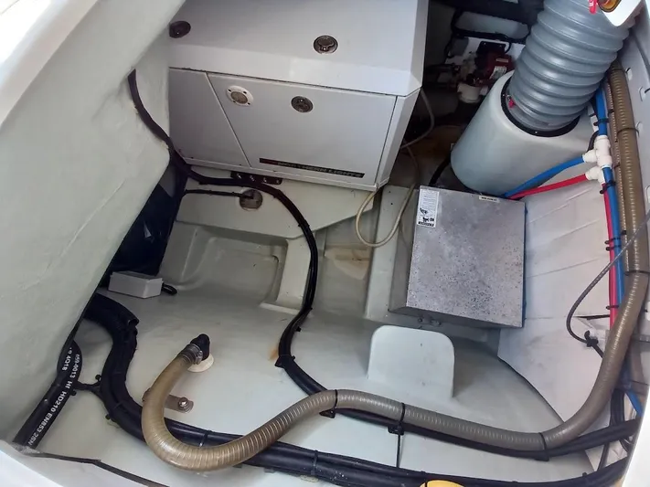 High Life Yacht Photos Pics Engine compartment of a 2020 Leopard 43 Powercat with visible wiring and components.