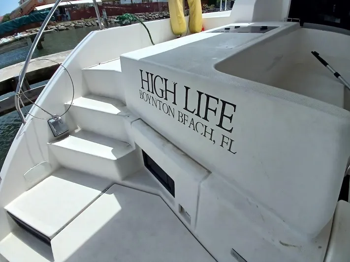 High Life Yacht Photos Pics Leopard 43 Powercat 2020 with "High Life" text, docked at Boynton Beach, FL.