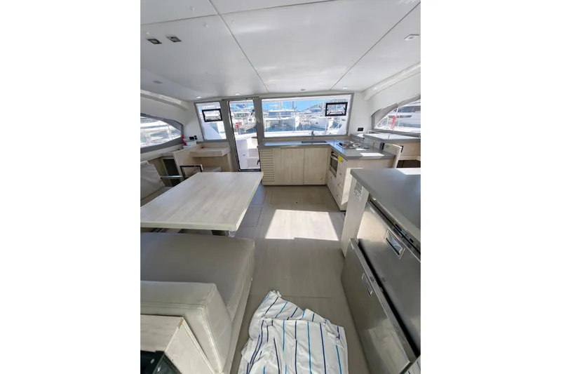 High Life Yacht Photos Pics Interior of 2020 Leopard 43 Powercat yacht, featuring modern kitchen and dining area.