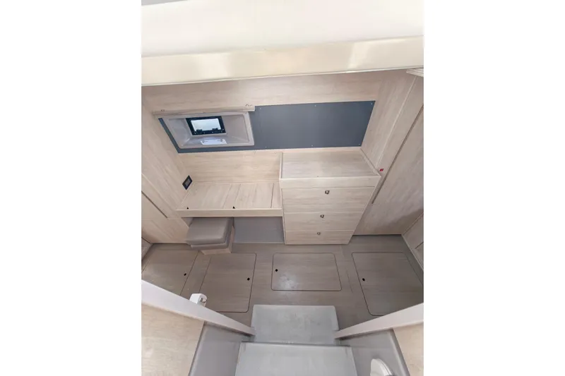 High Life Yacht Photos Pics Interior of 2020 Leopard 43 Powercat, featuring light wood cabinetry and compact design.
