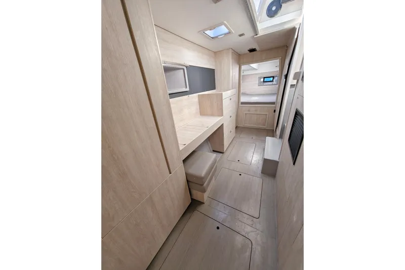 High Life Yacht Photos Pics Interior of 2020 Leopard 43 Powercat, featuring modern wood finishes and ample natural light.