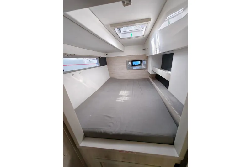 High Life Yacht Photos Pics 2020 Leopard 43 Powercat cabin interior with bed, skylight, and modern design.