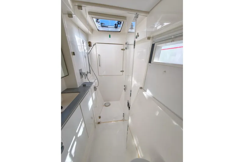 High Life Yacht Photos Pics Bathroom interior of 2020 Leopard 43 Powercat, featuring modern shower and sleek design.