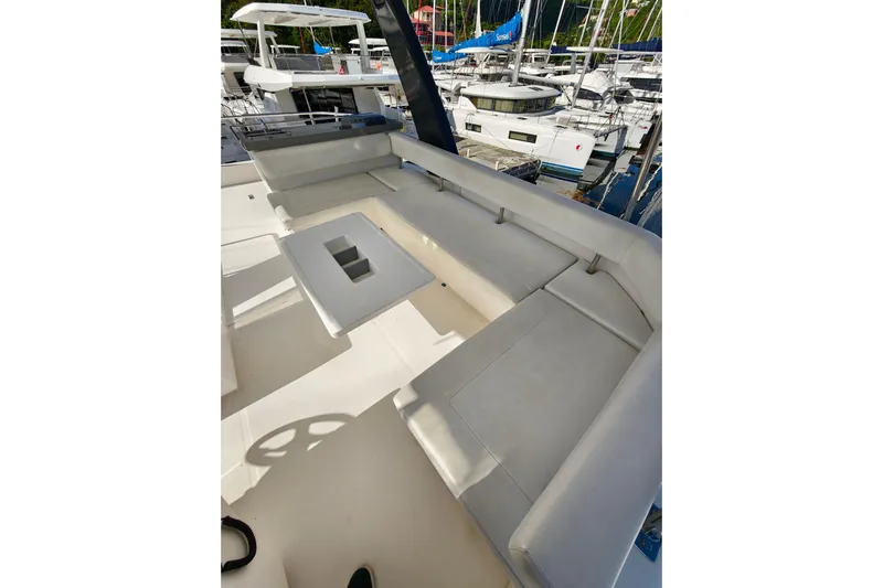 High Life Yacht Photos Pics Luxurious seating area on 2020 Leopard 43 Powercat yacht, docked at marina.