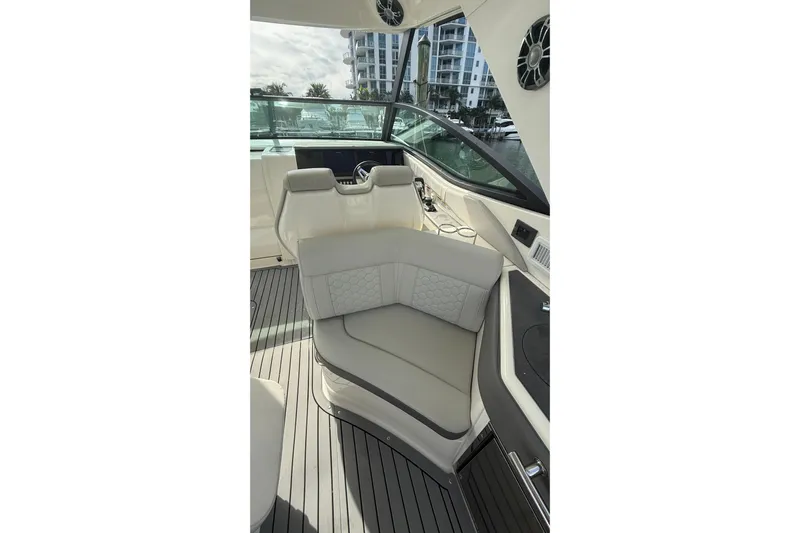 Mercy Yacht Photos Pics 2021 Sea Ray Sundancer 320 cockpit with luxurious seating and modern design.