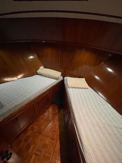  Yacht Photos Pics 1983 Sea Ranger 45 Sundeck cabin with twin beds and wooden interior.