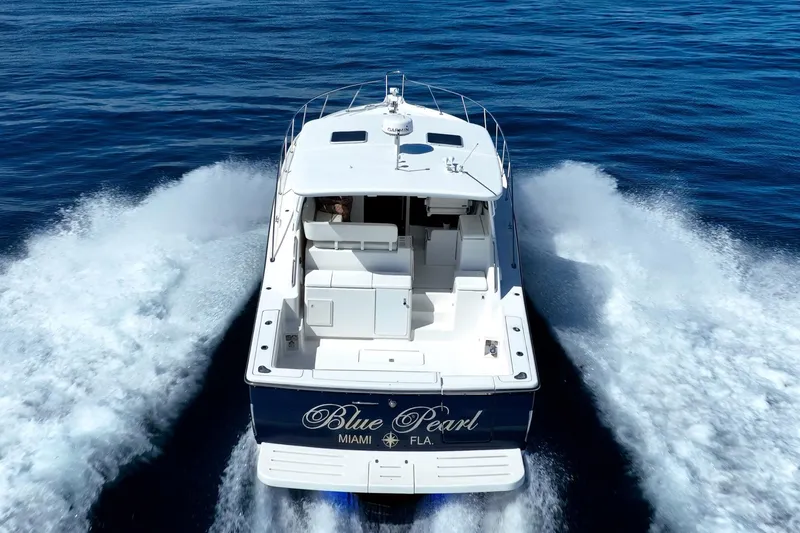 Blue Pearl Yacht Photos Pics 2004 Tiara Yachts 4200 Open "Blue Pearl" cruising in open water, Miami, Florida.