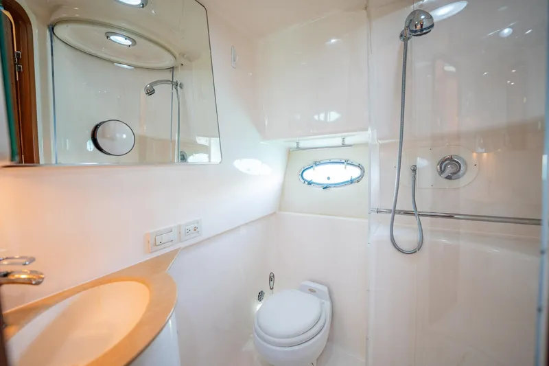 Blue Pearl Yacht Photos Pics Luxurious 2004 Tiara Yachts 4200 Open bathroom with shower and modern fixtures.